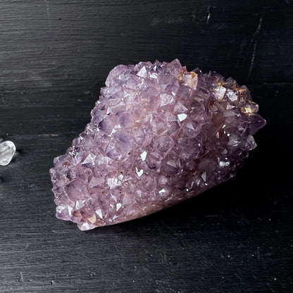 Amethyst Stalaktit aus Uruguay, eine Fläche poliert ca. 70mm